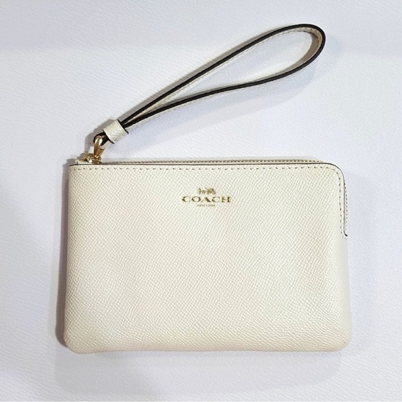 Coach Handbags - Sold COACH CORNER ZIP WRISTLET